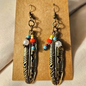 Antique bronze and bed dangle earrings